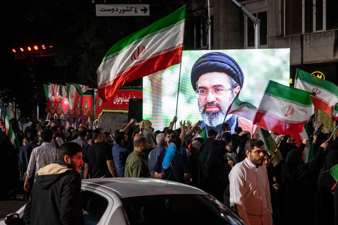 May 13, 2026, Tehran, Iran: Pro-government supporters gather during a state-organized rally on Shahid Keshvardoost Street in downtown Tehran, Iran, amid a ceasefire with Iran, the United States, and Israel.