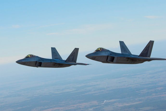 12 October 2022, Poland, Lask: Two US Air Force F-22 Raptor 