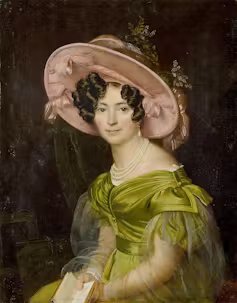 Retrato de Zinaida Volkonskaya con un vestido verde y un gran sombrero rosa.